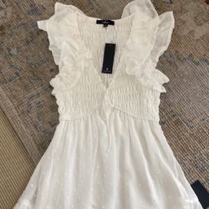 Lulu’s White Ruffled Smocked Mini Dress